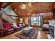 Spacious living room with wood accents, a cozy fireplace, and comfortable furniture at 181 Halfway Rd., Nichols, SC 29581