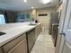 Well-lit kitchen featuring stainless steel appliances and ample counter space at 1900 Duffy St. # L-5, North Myrtle Beach, SC 29582
