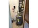 Utility closet with a water heater, AC unit and shelving at 1930 Bent Grass Dr. # 39H, Surfside Beach, SC 29575