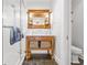 Modern bathroom featuring a glass-enclosed shower and wood vanity at 21 Whitehall Ave., Georgetown, SC 29440