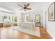 Sun-filled bedroom with hardwood floors, ceiling fan and bay window at 21 Whitehall Ave., Georgetown, SC 29440