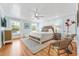 Inviting bedroom with hardwood floors, ceiling fan, and serene decor at 21 Whitehall Ave., Georgetown, SC 29440