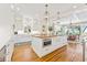 Open kitchen featuring a large island, modern appliances, and a seamless connection to the dining area at 21 Whitehall Ave., Georgetown, SC 29440