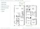 Detailed floor plan showcasing the layout of the home, including the kitchen, bedrooms, and covered patio at 2408 Hillbourne Loop, North Myrtle Beach, SC 29582