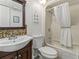 This bathroom has a standard shower/tub combo and a single sink vanity with storage space at 2500 N Ocean Blvd. # 102, Myrtle Beach, SC 29577