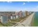 Resort grounds feature manicured lawns, palm trees, lounge chairs, and beach access at 2500 N Ocean Blvd. # 102, Myrtle Beach, SC 29577