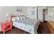 View of main bedroom featuring bright patterned linens, bedside tables, and framed pictures at 2500 N Ocean Blvd. # 102, Myrtle Beach, SC 29577
