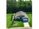 Aerial view of landscaped home with beautiful lawn, patio, and a view of the surrounding neighborhood at 251 Copper Leaf Dr., Myrtle Beach, SC 29588