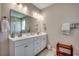 Well-appointed bathroom with double vanity, modern fixtures, and ample storage, creating a functional and stylish space at 251 Copper Leaf Dr., Myrtle Beach, SC 29588