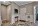 Inviting entryway with light wood floors, wainscoting, and a stylish front door for a warm welcome at 251 Copper Leaf Dr., Myrtle Beach, SC 29588
