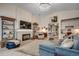 Bright living room with a stone fireplace, vaulted ceiling, and an open layout at 251 Copper Leaf Dr., Myrtle Beach, SC 29588
