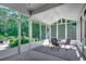 Screened patio with comfortable seating, perfect for enjoying the outdoors while being protected from insects at 251 Copper Leaf Dr., Myrtle Beach, SC 29588