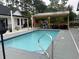 Sparkling outdoor pool with an outdoor kitchen area perfect for relaxing and entertaining at 2529 Suzanne Dr., Conway, SC 29526