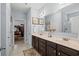 Bathroom featuring double vanity, and a doorway to the walk-in closet at 260 Dunbarton Ln., Conway, SC 29526