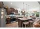 Stylish kitchen boasts stainless steel appliances, granite counters, and pendant lighting, perfect for culinary enthusiasts at 260 Dunbarton Ln., Conway, SC 29526