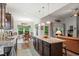 Open-concept layout with granite island connecting the kitchen, dining and living areas at 260 Dunbarton Ln., Conway, SC 29526