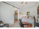Multi-purpose room with daybed and sliding barn door, creating flexible living or office space at 260 Dunbarton Ln., Conway, SC 29526