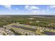 An elevated view shows the community layout, with a central lake and green surroundings at 284 Whipple Run, Myrtle Beach, SC 29588