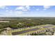 A scenic community view features a beautiful lake surrounded by homes and lush greenery at 284 Whipple Run, Myrtle Beach, SC 29588