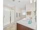 Bathroom vanity featuring double sinks with full mirror and glass shower at 284 Whipple Run, Myrtle Beach, SC 29588
