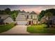 A charming two-story home featuring a manicured lawn and an inviting front entrance at 284 Whipple Run, Myrtle Beach, SC 29588