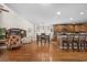 Modern kitchen with hardwood floors, stainless steel appliances, and island seating at 284 Whipple Run, Myrtle Beach, SC 29588
