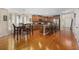 Well-lit kitchen and dining area with stainless steel appliances and hardwood flooring at 284 Whipple Run, Myrtle Beach, SC 29588
