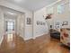 Open concept living room featuring hardwood floors and a staircase at 284 Whipple Run, Myrtle Beach, SC 29588