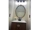 Bathroom with a decorative mirror, sleek vanity, and a modern faucet at 3017 Mercer Dr. # 0, Conway, SC 29526