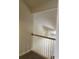 The stairwell features white railings and neutral paint at 3017 Mercer Dr. # 0, Conway, SC 29526