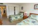 Cozy bedroom with two twin beds and closet at 305 N Hillside Dr. # 206, North Myrtle Beach, SC 29582