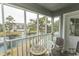 Relaxing screened patio with scenic lake view, perfect for unwinding at 305 N Hillside Dr. # 206, North Myrtle Beach, SC 29582