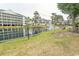 Picturesque pond with fountain and surrounding landscape at 305 N Hillside Dr. # 206, North Myrtle Beach, SC 29582