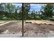 View of the home's backyard, with trees in the distance at 3072 Palma Way, Myrtle Beach, SC 29579