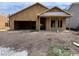 New home construction includes a front porch and a spacious two-car garage at 3072 Palma Way, Myrtle Beach, SC 29579