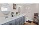 Renovated bathroom featuring double vanity, modern fixtures, decorative mirrors, and a separate toilet area at 4 Clemson Rd., Conway, SC 29526