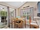 Cozy dining area featuring a wood table, chairs, and natural light at 4 Clemson Rd., Conway, SC 29526