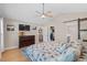 This main bedroom features a vaulted ceiling, ensuite, ceiling fan, television and ample closet space at 4 Clemson Rd., Conway, SC 29526