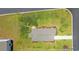 Birds eye view of a well-manicured home with a driveway, landscaping, and nearby green spaces at 402 Toledo St., Conway, SC 29526