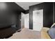 A cozy carpeted bedroom features neutral walls and a mini basketball hoop on the door at 402 Toledo St., Conway, SC 29526