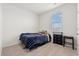 Cozy bedroom featuring neutral carpet, a window with blinds, and a comfortable twin bed at 402 Toledo St., Conway, SC 29526