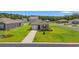 A well-kept home with a driveway, garage, and manicured lawn, offering comfort and style at 402 Toledo St., Conway, SC 29526