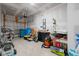 Unfinished garage with exposed framing, garage door opener, tools and ample storage space at 402 Toledo St., Conway, SC 29526