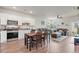 Inviting open-concept living area features a modern kitchen, a dining space, and a relaxing lounge area at 402 Toledo St., Conway, SC 29526