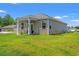 A charming home with a covered porch, perfect for relaxing and enjoying the outdoors at 402 Toledo St., Conway, SC 29526