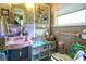 Cozy bathroom featuring floral wallpaper, pink sink, and blue tile at 404 13Th Ave. S, Myrtle Beach, SC 29577