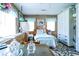 Bedroom with wood-paneled walls and views of the backyard at 404 13Th Ave. S, Myrtle Beach, SC 29577