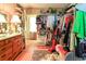 Spacious walk-in closet with wood paneled walls and lots of storage space at 404 13Th Ave. S, Myrtle Beach, SC 29577