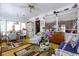 Sunlit living space featuring a comfortable seating area, natural lighting, and stylish decor at 404 13Th Ave. S, Myrtle Beach, SC 29577
