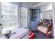 Sunroom with chair, cabinet, and open windows at 404 13Th Ave. S, Myrtle Beach, SC 29577